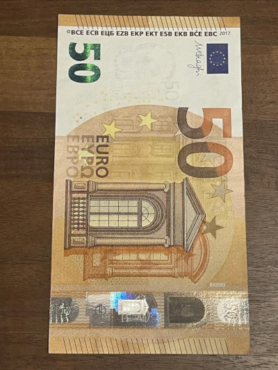 欧洲央行行长称欧元有望成为美元的替代货币