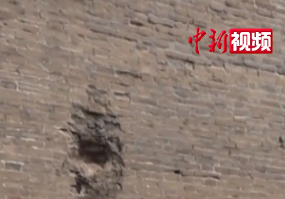 宛平城墙上累累弹痕 郑福来孙女：爷爷反对修复，这是日本侵华历史见证