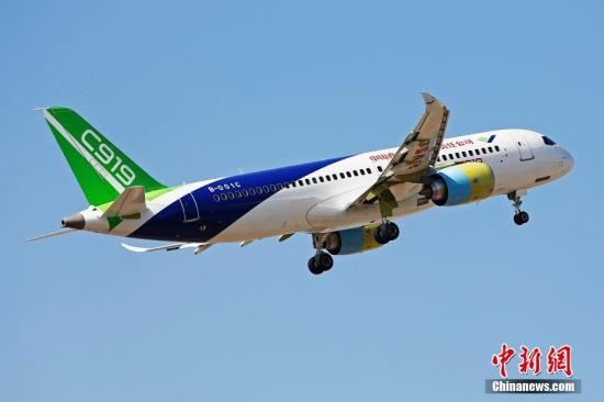 资料图：C919。 <a target='_blank'  data-cke-saved-href='http://www.chinanews.com/' href='http://www.chinanews.com/'>中新社</a>记者 殷立勤 摄